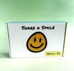 A box with the words " share a smile ".
